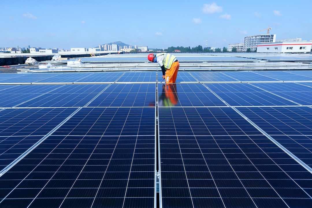 Solar panels on a warehouse rooftop
